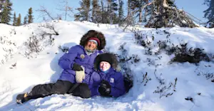 Nat Hab guests in abandoned polar bear den, Churchill, Manitoba.