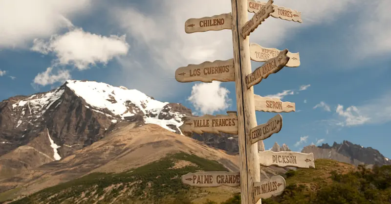 Hiking trail sign post, Torres del Paine National Park, Patagonia, Chile. 