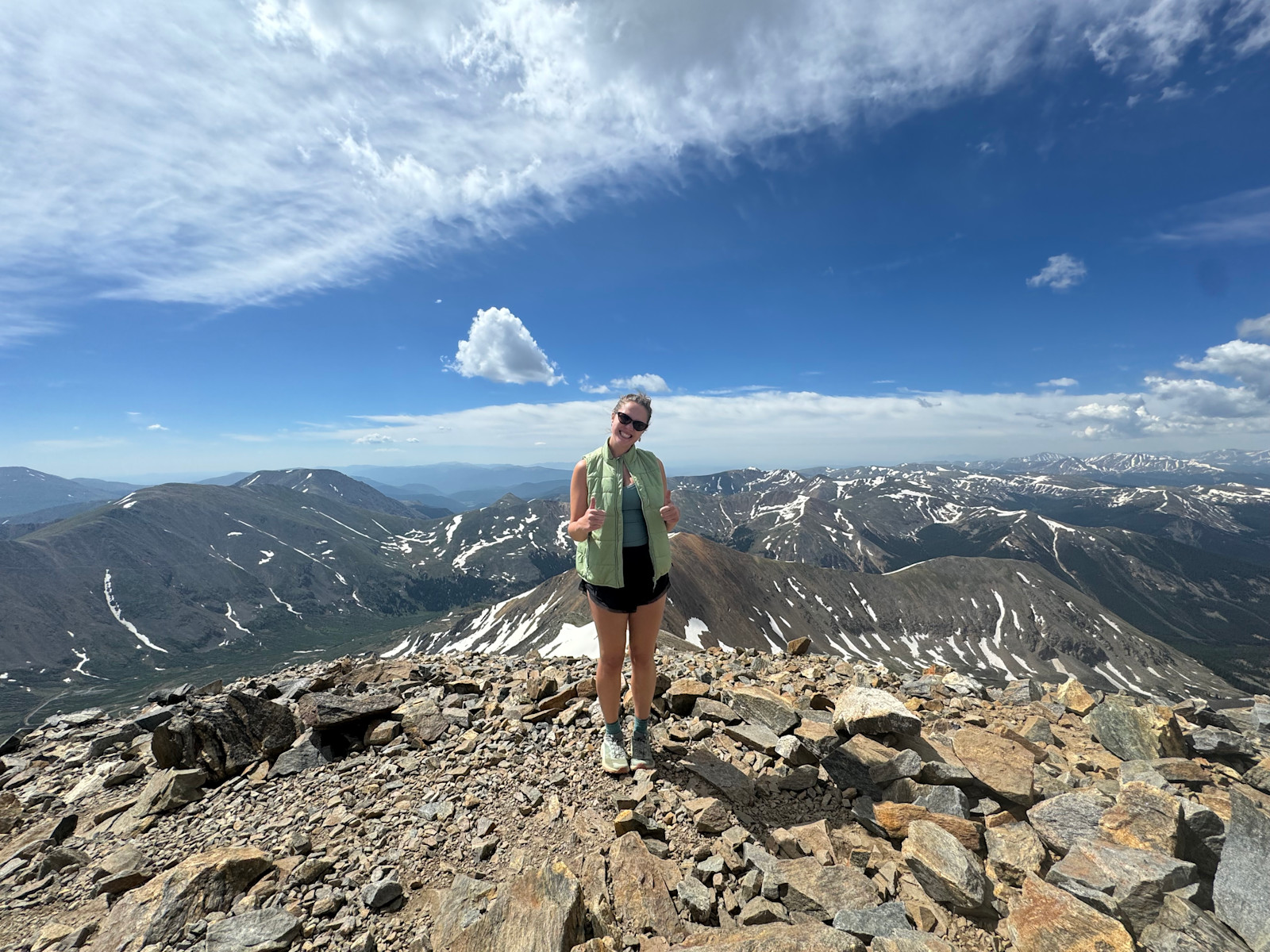 Reaching the summit of my first 14er on Grays Peak, Colorado.