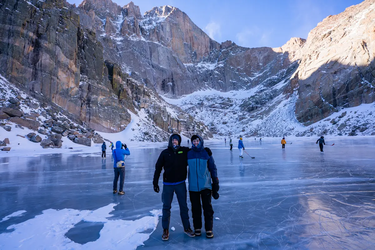 Bundling up on the frozen shores of Chasm Lake in Rocky Mountain National Park, Colorado.