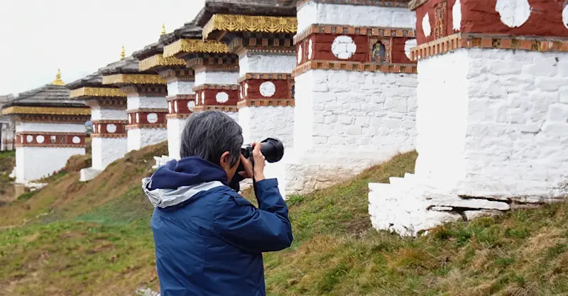 Nat Hab guest photographs memorial chortens, Dochu La Pass, Bhutan. 