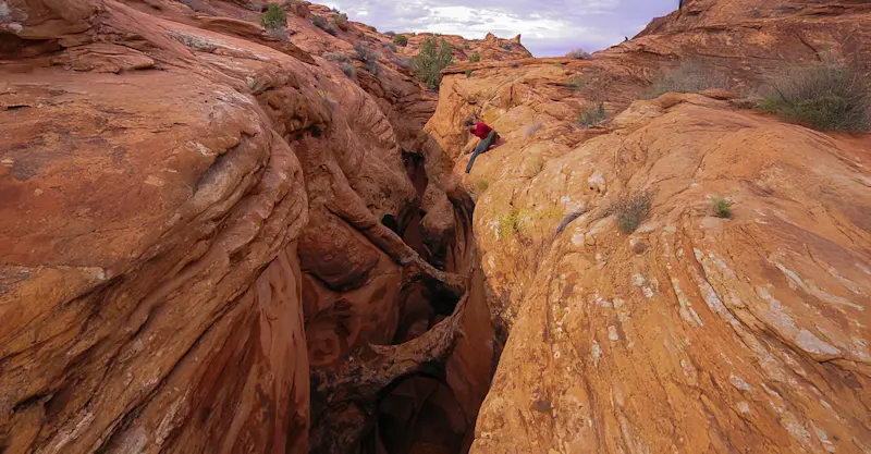 Adventuring through winding sandstone wonderlands in Escalante, Utah.