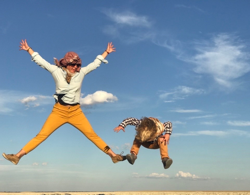 Jumping with Clayton in Makgadikgadi Salt Pans, Kalahari Desert, Botswana.