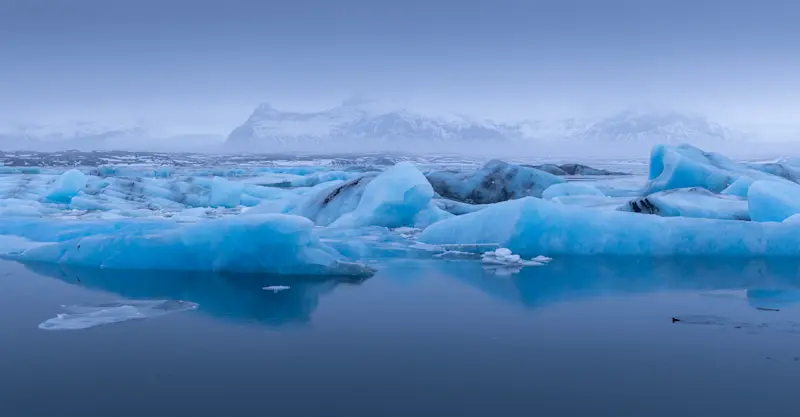 Fresh icebergs float in a lagoon in Jokulsarlon, Iceland.