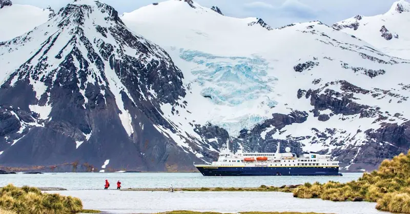 National Geographic Explorer anchored near a glacier, South Georgia Island.