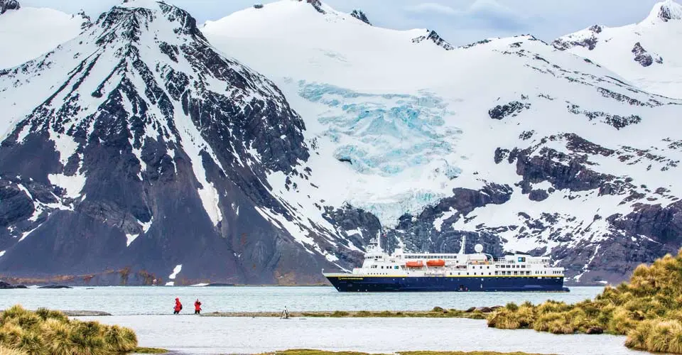 National Geographic Explorer anchored near a glacier, South Georgia Island.