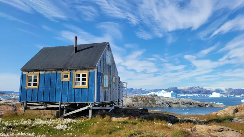 Experiencing a beautiful day near a house in Tinit, East Greenland.