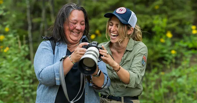 Learning camera tips from Nat Hab's Dana Cama.