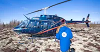 Nat Hab guest boarding helicopter, Churchill, Manitoba.