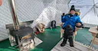 Nat Hab guest in the Aurora Sphere, Churchill, Manitoba.