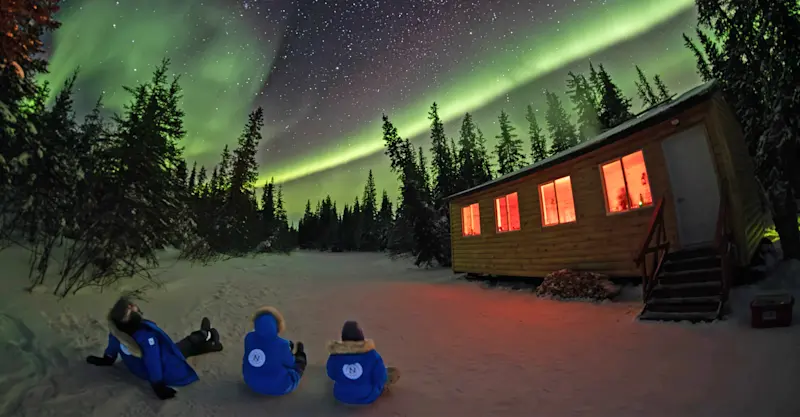 Nat Hab guests viewing northern lights, Churchill, Manitoba.