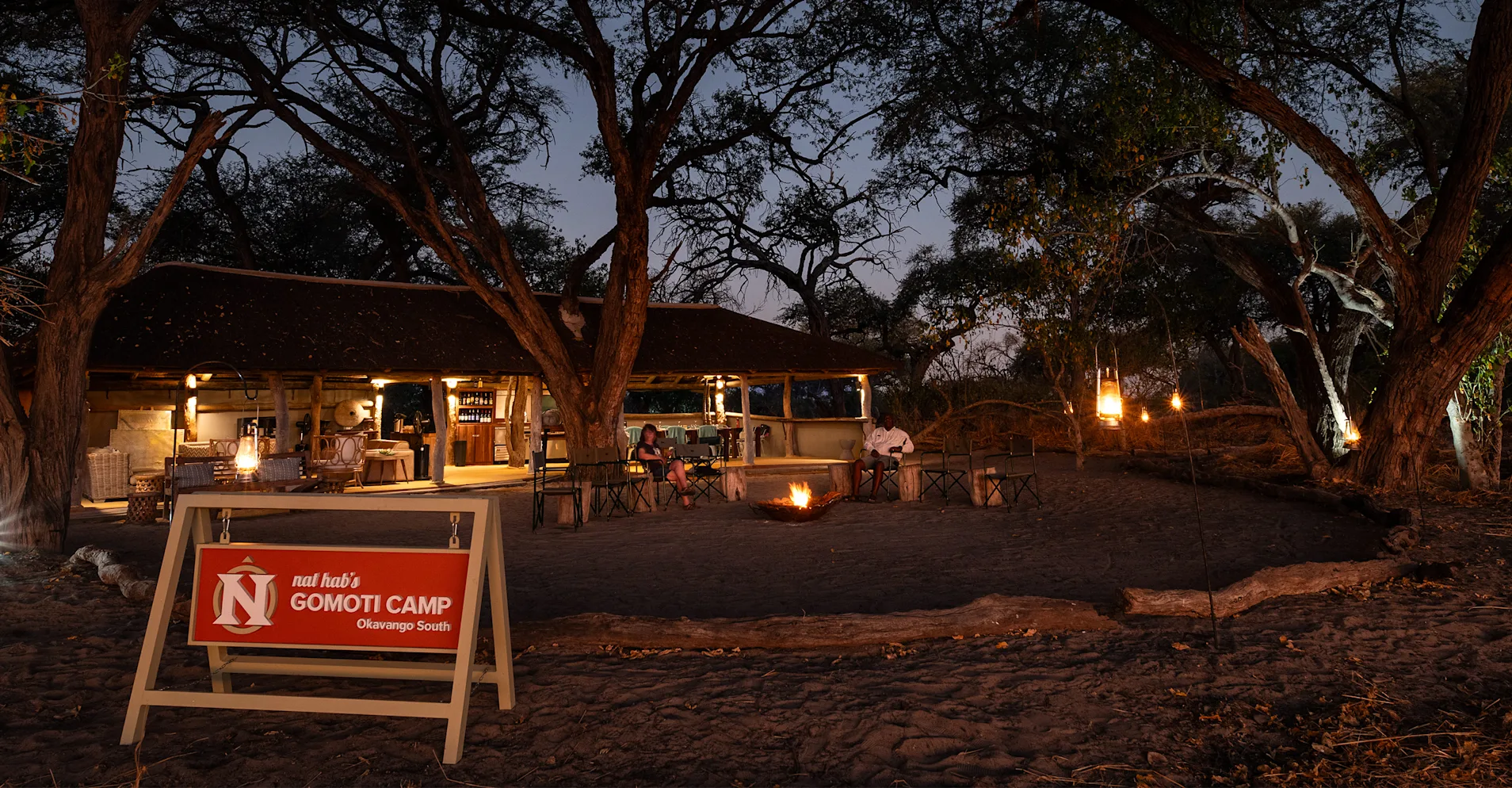 Travelers lounging outside in the evening