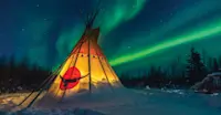 Northern lights above tepee, Churchill, Manitoba.