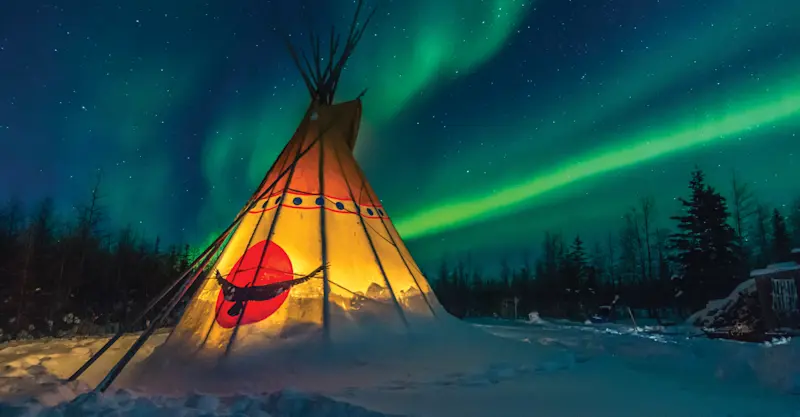Northern lights above tepee, Churchill, Manitoba.