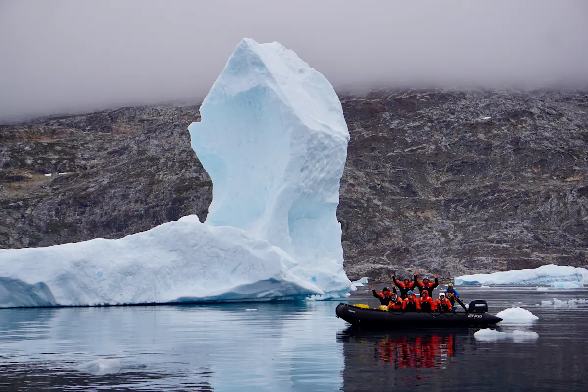 Cruising through icebergs on Nat Hab's Basecamp Greenland Expedition in East Greenland.