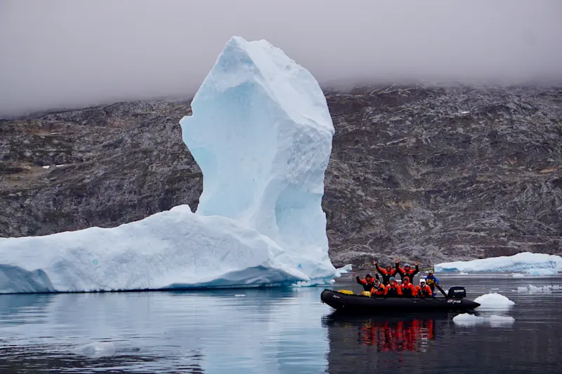 Cruising through icebergs on Nat Hab's Basecamp Greenland Expedition in East Greenland.