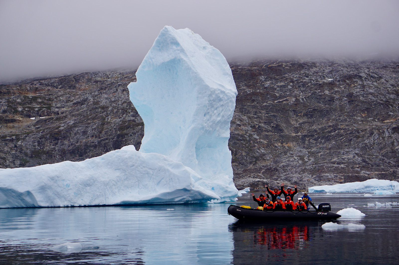Cruising through icebergs on Nat Hab's Basecamp Greenland Expedition in East Greenland.