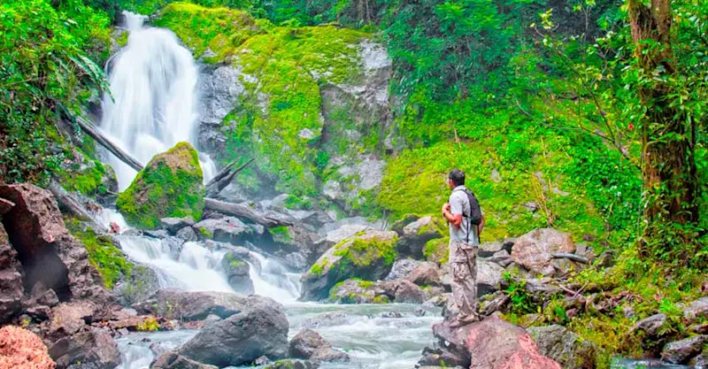 Nat Hab guest at San Pedrillo waterfall, Corcovado National Park, Costa Rica.