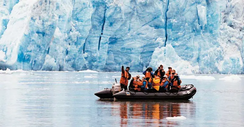 Nat Hab guests on zodiac, Sawyer Glacier, Tracy Arm, Alaska.