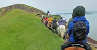 Nat Hab guests horseback riding, Iceland.
