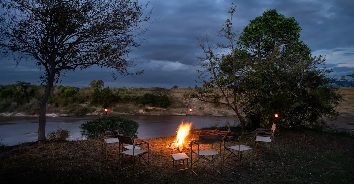 Camp fire at Nat Hab's Migration Camp—Maasai Mara.