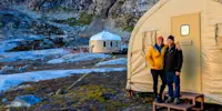 Nat Hab guests by the Endurance Hall, Nat Hab's Base Camp Greenland.