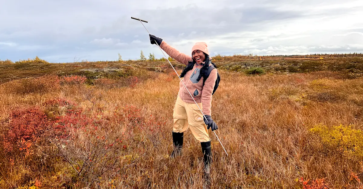 Earthwatch Expeditions guest taking measurements, Churchill, Manitoba, Canada.