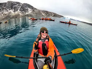 Going for a sea kayak right off the shore of our very own Base Camp in Greenland.