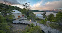 Walkway to guest yurt with lake view