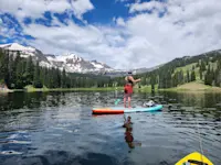 Gliding across the water by paddleboard in Crested Butte, Colorado.