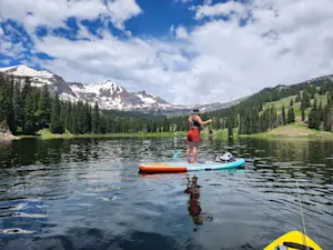 Gliding across the water by paddleboard in Crested Butte, Colorado.
