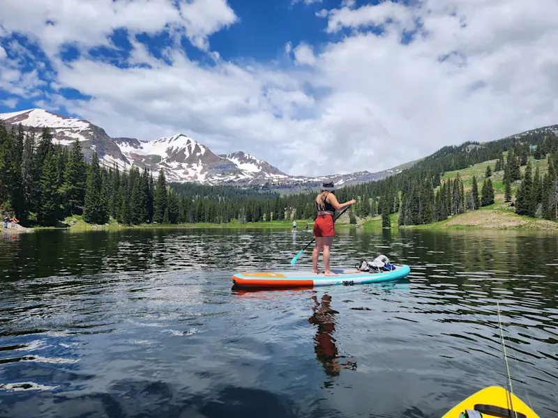 Gliding across the water by paddleboard in Crested Butte, Colorado.