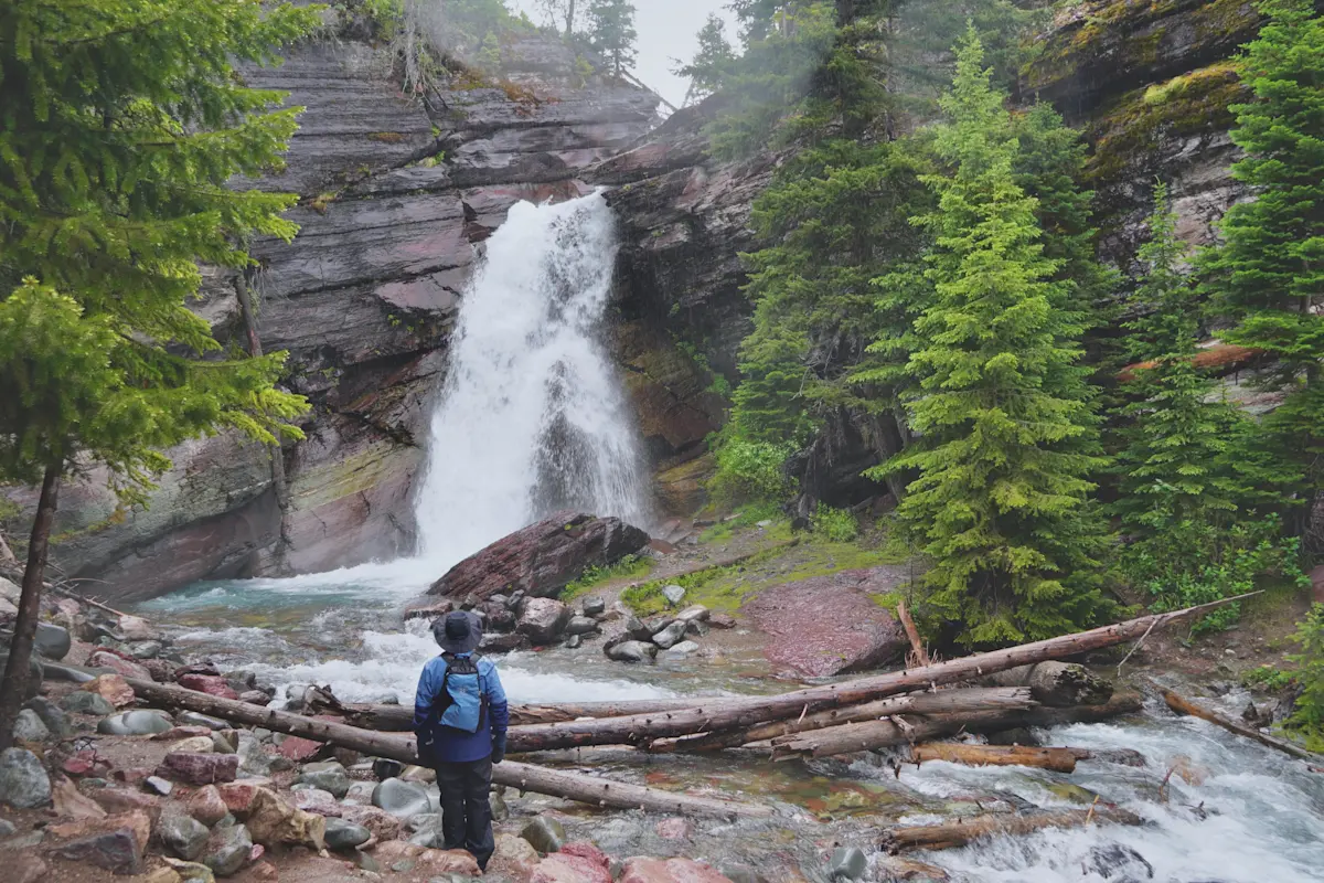 Nat Hab guest, Baring Falls, Glacier National Park, Montana.
