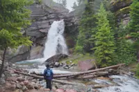 Nat Hab guest, Baring Falls, Glacier National Park, Montana.
