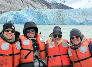 Enjoying a chilly and special family moment in front of Dawes Glacier, Endicott Arm, Alaska.