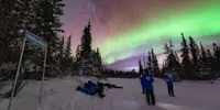 Nat Hab guests viewing northern lights, Churchill, Manitoba.