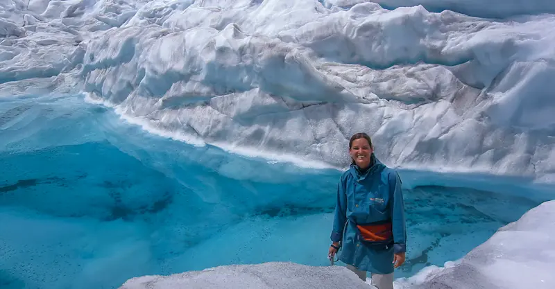 Exploring icy blue beauty at Franz Josef Glacier, New Zealand.