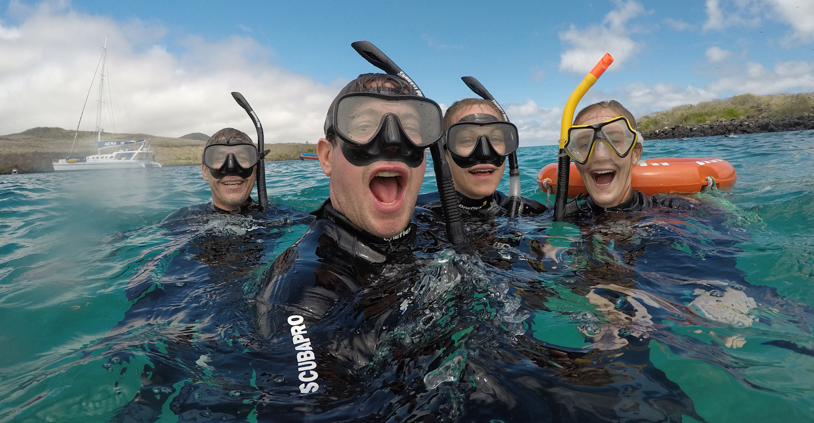 Snorkeling in the crystal-clear waters near Espanola in the Galapagos Islands.
