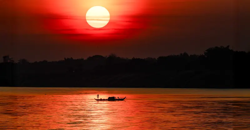 Boat at sunset, Vietnam.