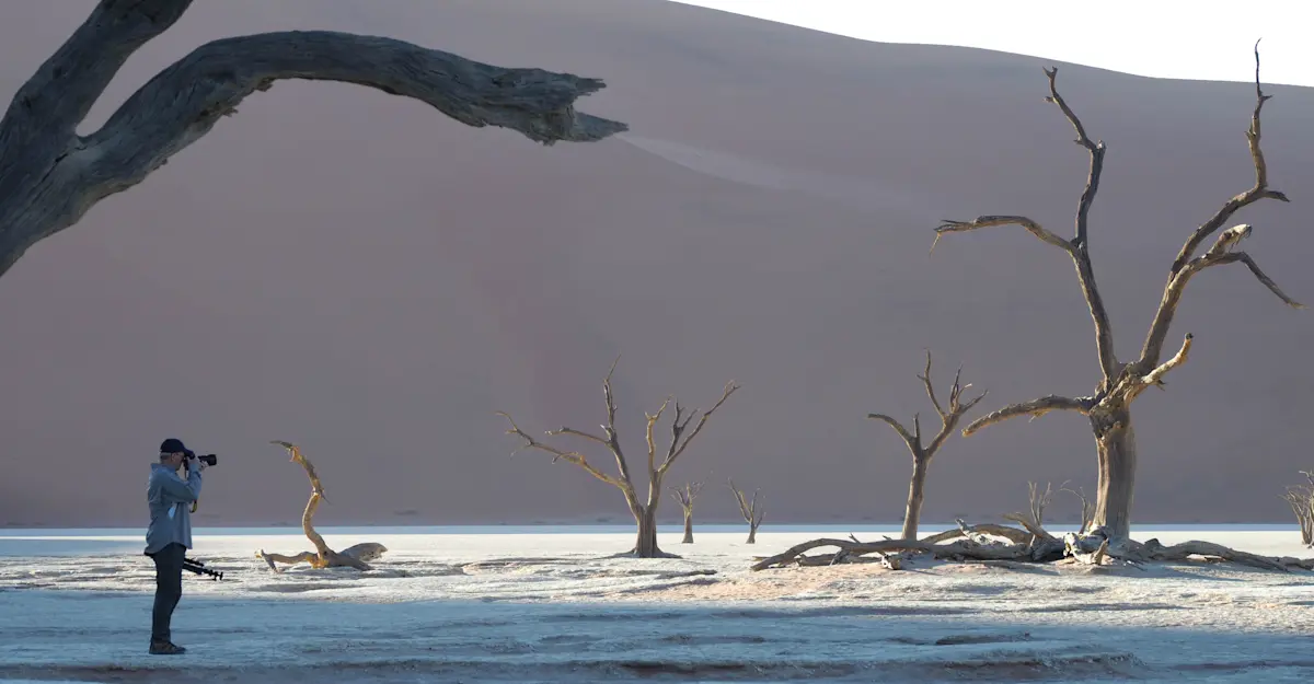 Nat Hab Guest photographing Deadvlei, Sossusvlei, Namibia.