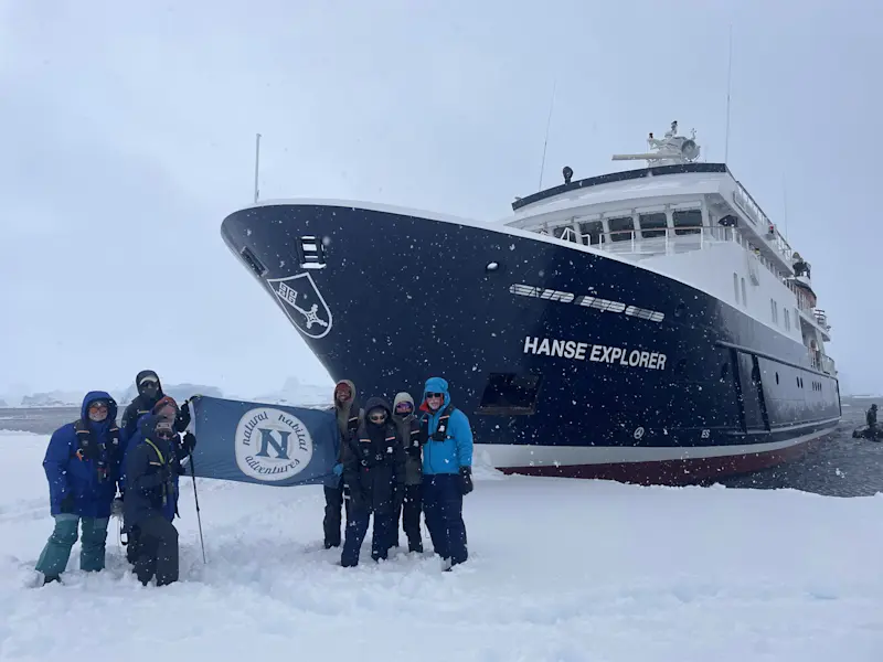Nat Hab guests and Hanse Explorer, Antarctica.