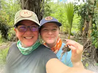 Tree planting as part of a reforestation project in the Amazon, Peru.