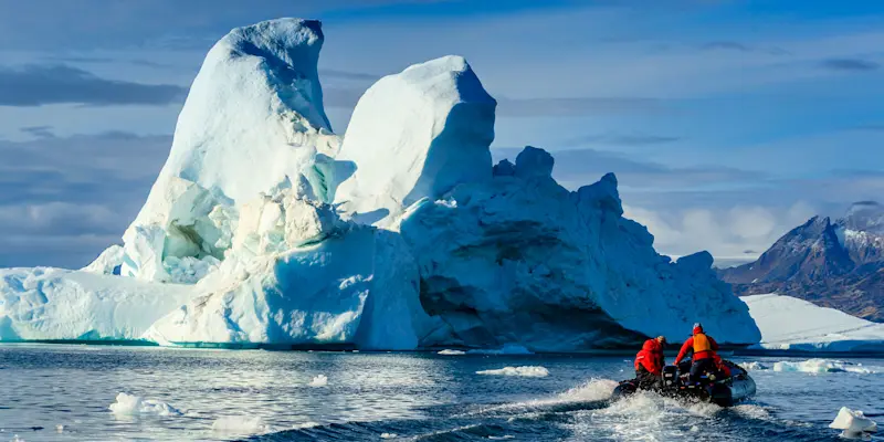 Nat Hab guests on zodiac cruise, Sermilik Fjord, Greenland.