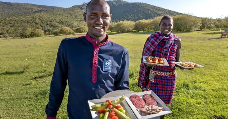 Camp staff at Nat Hab's Migration Camp—Serengeti National Park, Tanzania.