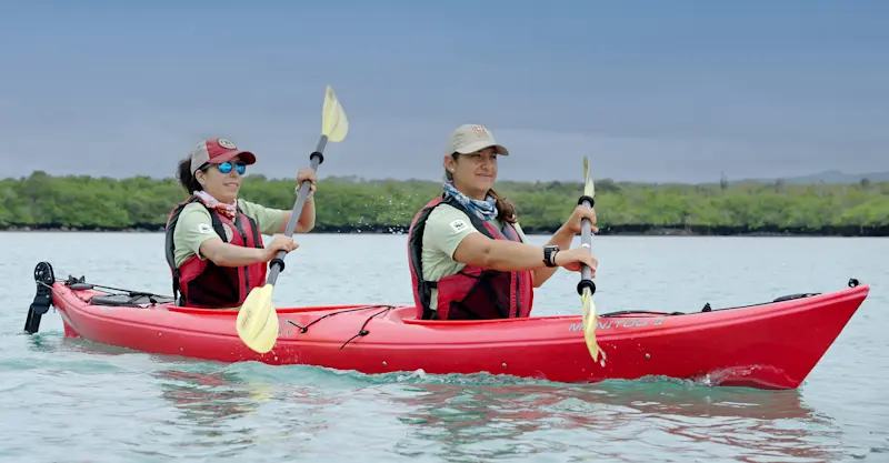 Nat Hab guests kayaking, Galapagos Islands, Ecuador.