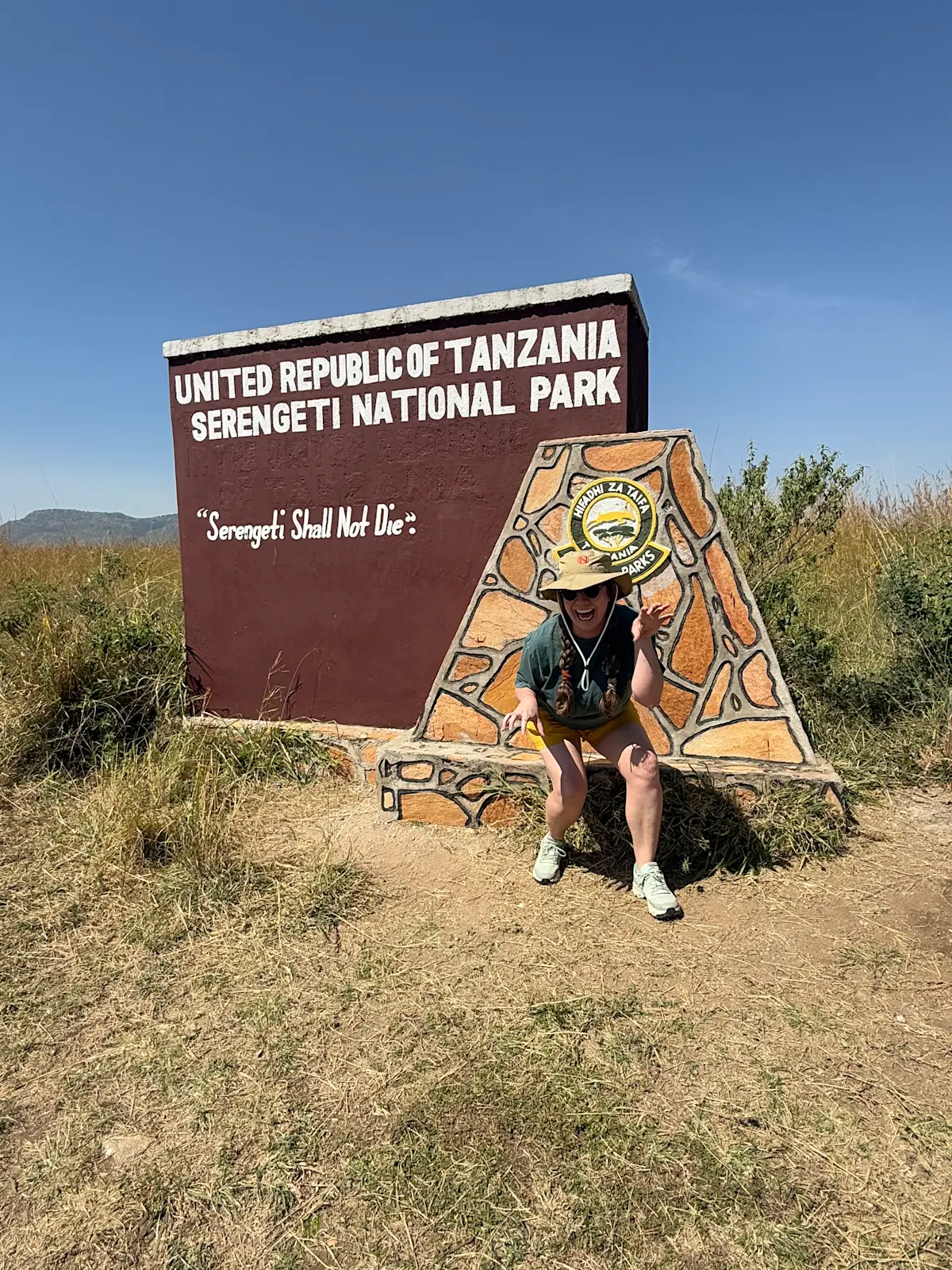 Popping in for a cheeky photo opportunity and embracing the adventure in Tanzania, Africa.