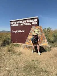 Popping in for a cheeky photo opportunity and embracing the adventure in Tanzania, Africa.