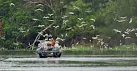 Nat Hab guests on a skiff ride, Pacaya Samiria National Reserve, Peru.