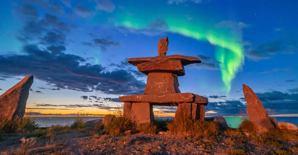 Northern lights and Inukshuk, Churchill, Manitoba.