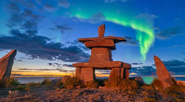 Northern lights and Inukshuk, Churchill, Manitoba.